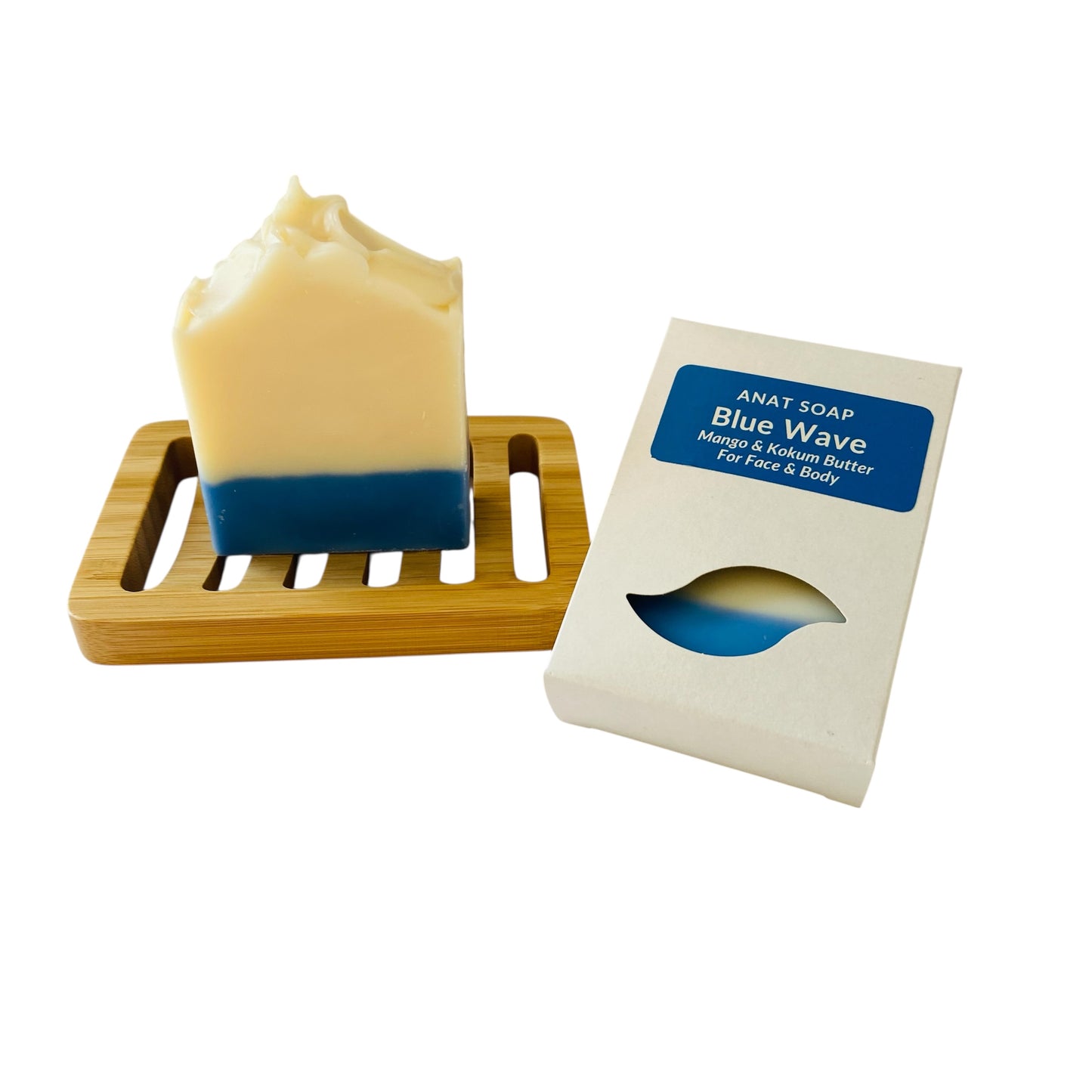 Anat Soap Blue Wave handmade plant-based soap bar with mango and kokum butter for face and body, shown on a bamboo soap dish next to the product box.
