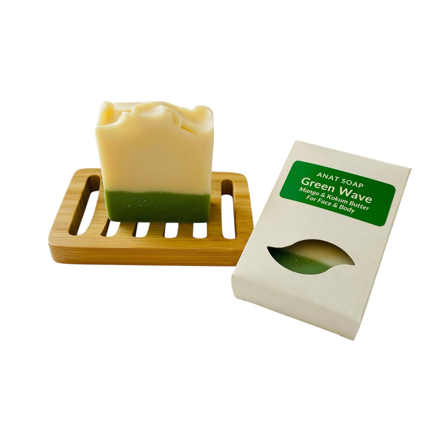 Anat Soap Green Wave handmade plant-based soap bar with mango and kokum butter for face and body, shown on a bamboo soap dish next to the product box.