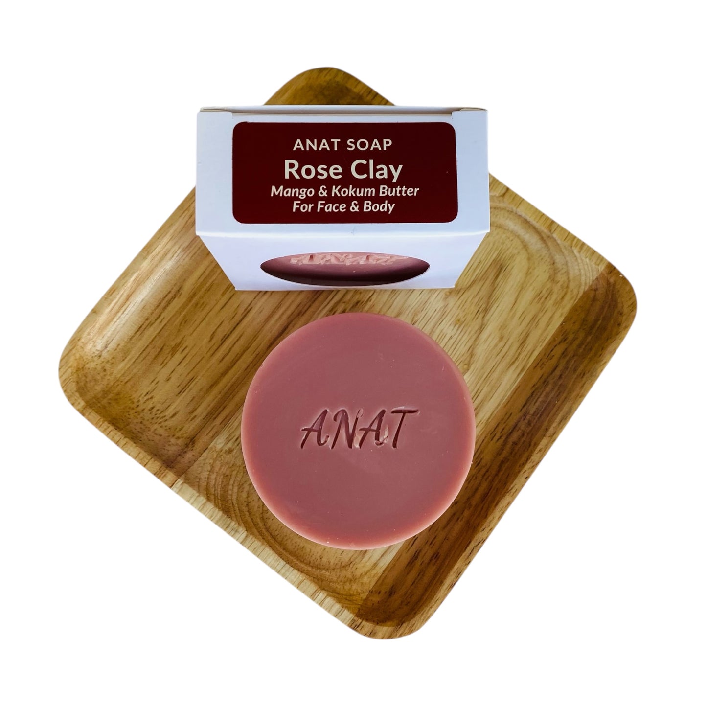 Anat Soap Rose Clay round handmade plant-based soap bar with mango and kokum butters for face and body, shown on a bamboo soap dish next to the product box.