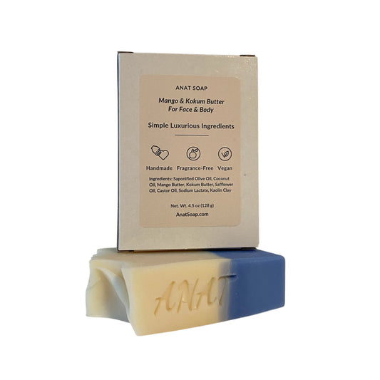 Anat Soap Blue & Ivory handmade plant-based soap bar with mango and kokum butter for face and body, shown with back of box displaying ingredients, fragrance-free and vegan.