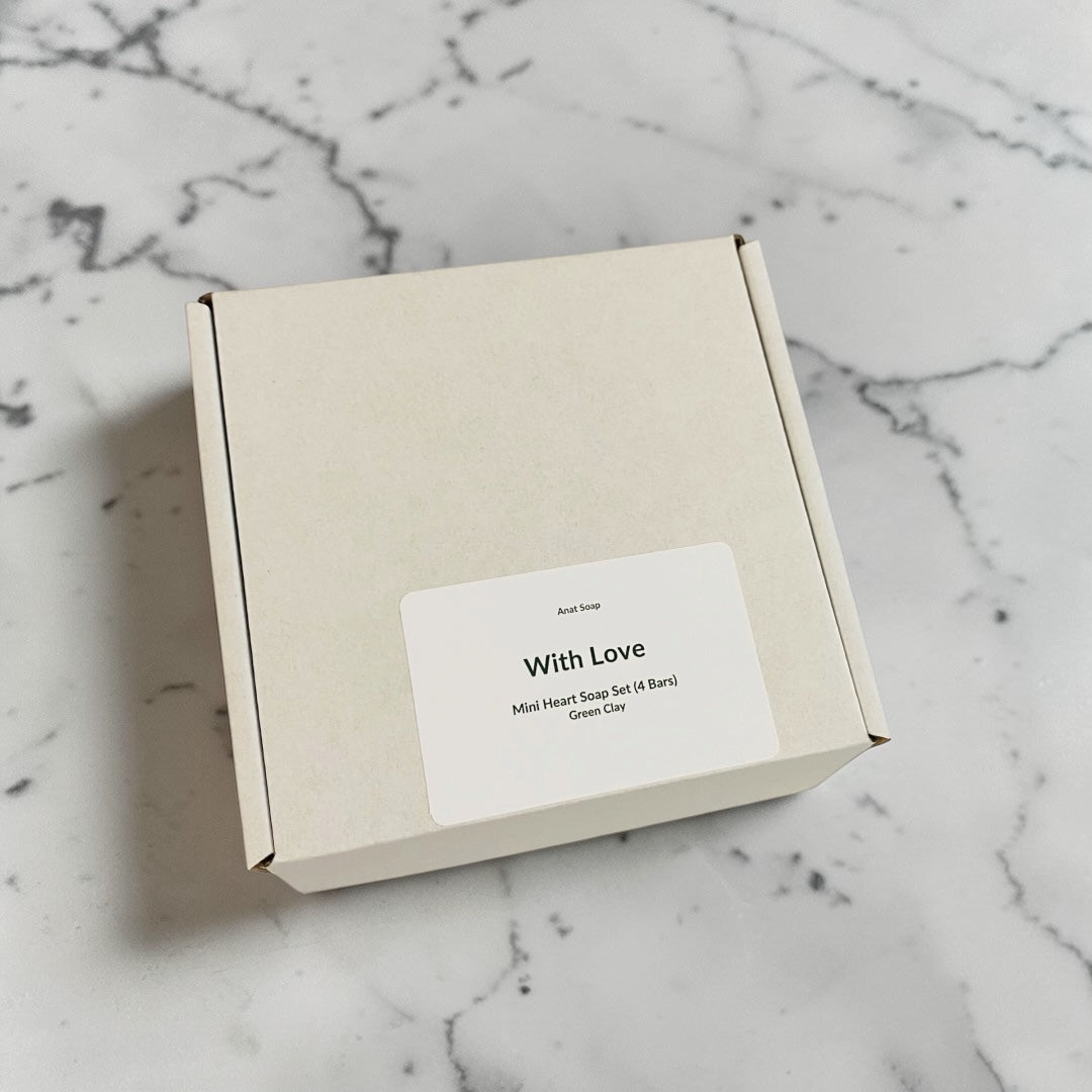 Closed gift box with With Love label for mini heart soap set