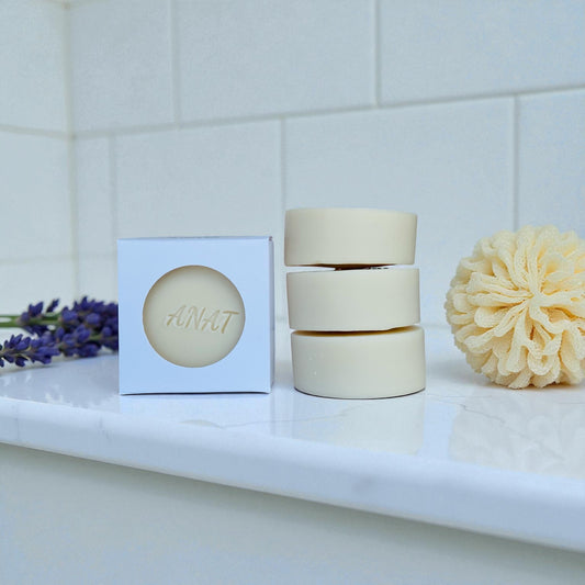 Anat Soap White Clay round handmade plant-based soap bar with mango and kokum butters for face and body.