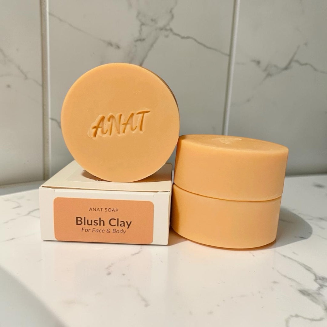 Anat Soap Blush Clay round handmade plant-based soap bar with mango and kokum butters for face and body.
