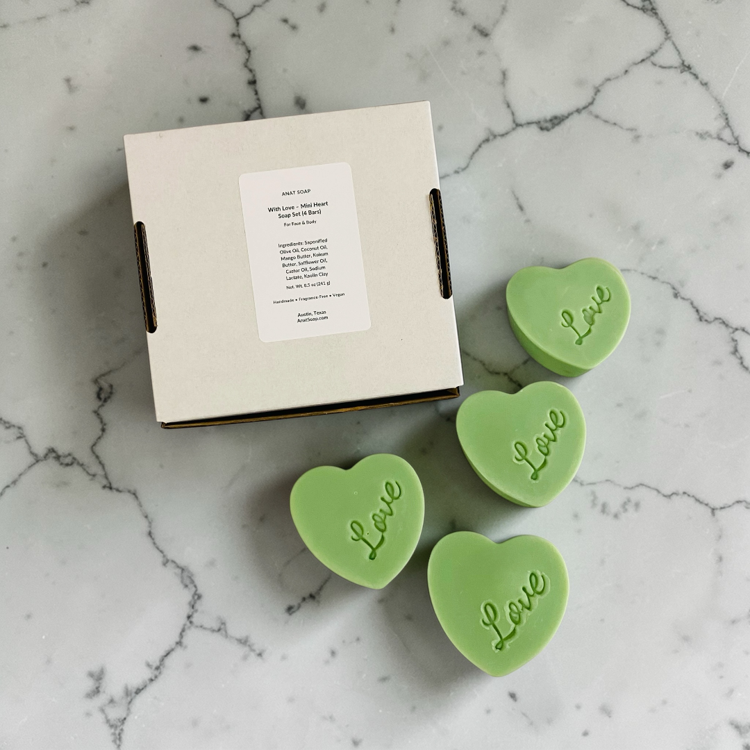 Green mini heart soap bars next to box, fragrance-free handmade soap set