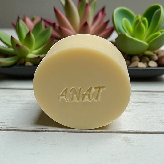 Anat Soap White Clay round handmade plant-based soap bar with mango and kokum butters for face and body.